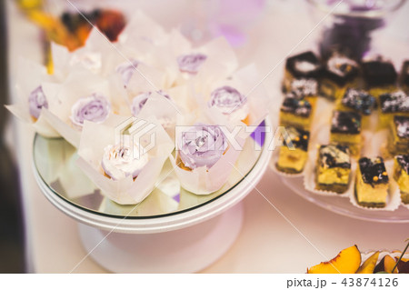 Delicious wedding reception candy bar dessert table Delicious wedding reception candy bar dessert table 43874126