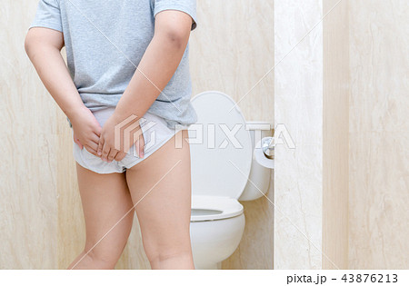 child has Diarrhea Holding his Butt in toilet, child has Diarrhea Holding his Butt in toilet, 43876213