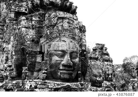 Face carved into stone of the ancient Bayan Temple at Angkor Wat, Cambodia. Face carved into stone of the ancient Bayan Temple at Angkor Wat, Cambodia. 43876887