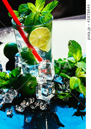 glass of mojito with lime and mint ice cube 43878644