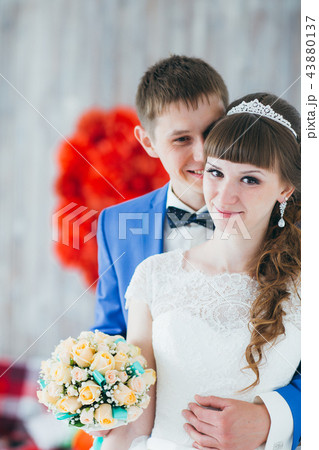 young bride and groom in interior design studio 43880137