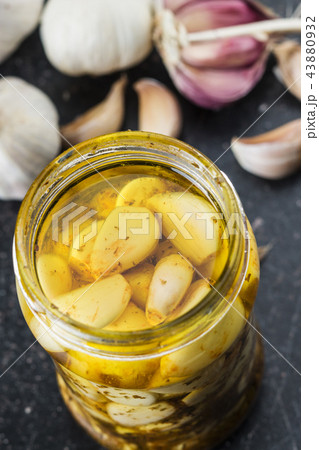 Marinated garlic. Pickled garlic. 43880932
