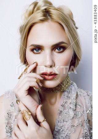 young pretty woman with party make up elegant dress on white bac young pretty woman with party make up elegant dress on white bac 43883409