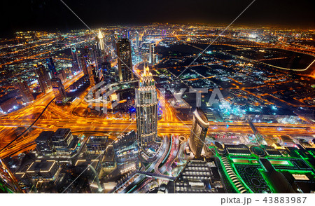 Dubai skyline during night with amazing city center lights and Sheikh Zayed road traffic,United Arab Emirates. 43883987
