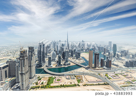 Aerial view of modern city skyscrapers in Dubai, UAE. 43883993