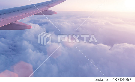 Sunset sky from the airplane window Sunset sky from the airplane window 43884062