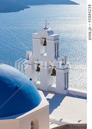 The Three bells of Fira and blue dome, Santorini, Greece. 43884238