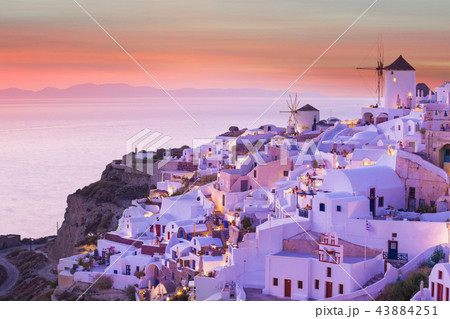 The famous sunset at Santorini in Oia village The famous sunset at Santorini in Oia village 43884251