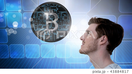 Man with computer servers and bitcoin technology information interface Man with computer servers and bitcoin technology information interface 43884817
