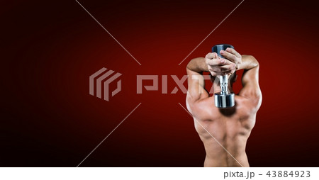 Bodybuilding weight lifter man with blank red background 43884923
