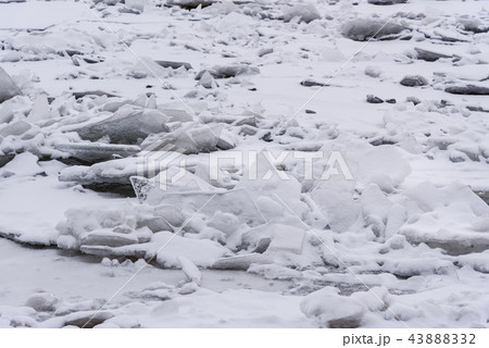 Ice hummock on Frozen Neva River  43888332