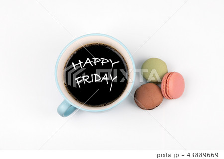 Happy Friday. coffee mug and macarons 43889669