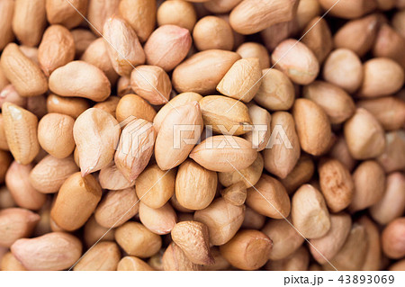 close up peanuts on background. top view.. close up peanuts on background. top view.. 43893069