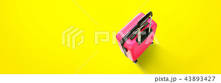 banner Top view fuchsia suitcase isolated yellow banner Top view fuchsia suitcase isolated yellow 43893427