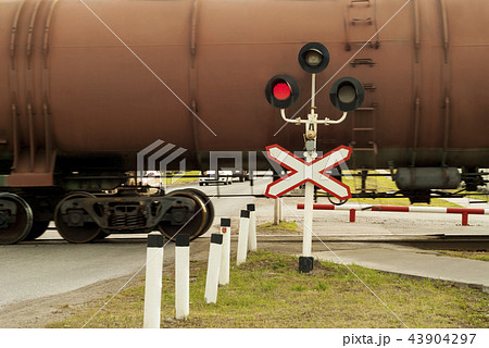 traffic light and sign at the railway crossing traffic light and sign at the railway crossing 43904297