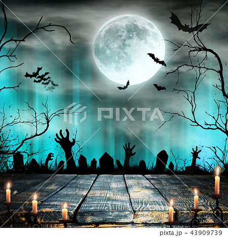 Spooky Halloween background with zombie hands. 43909739