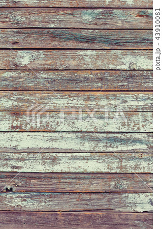 Old teal shabby wooden planks with cracked paint 43910081