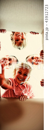 Happy family unpacking boxes 43912723