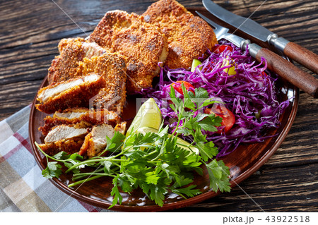 close up of breaded pork fillet, rustic style close up of breaded pork fillet, rustic style 43922518