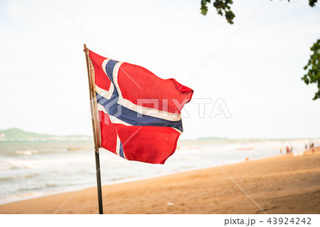 The Norwegian flag waving in the wind 43924242