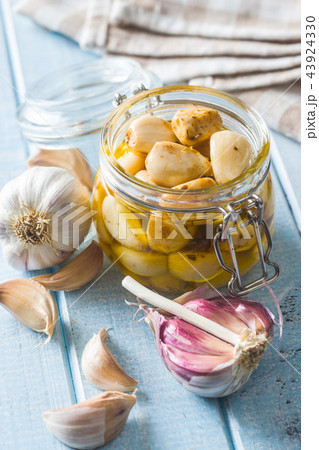 Marinated garlic. Pickled garlic. Marinated garlic. Pickled garlic. 43924330