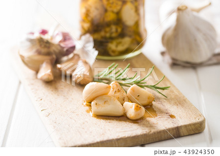 Marinated garlic. Pickled garlic. 43924350