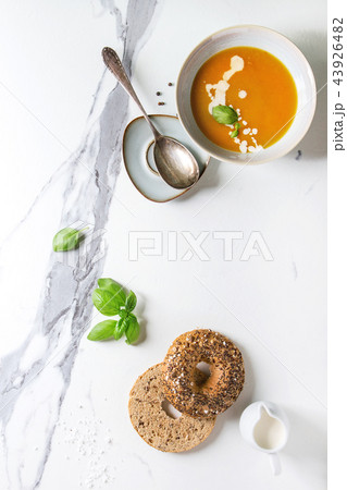 Pumpkin or carrot soup 43926482