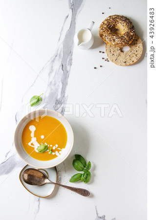 Pumpkin or carrot soup 43926483