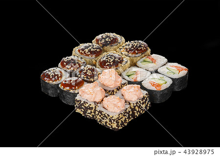Sushi, rolls on a black isolated background 43928975