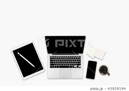 Office table with laptop, tablet and mobile phone. Office table with laptop, tablet and mobile phone. 43929194