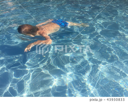 Caucasian child diving in swimming pool Caucasian child diving in swimming pool 43930833