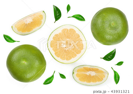 Citrus Sweetie or Pomelit, oroblanco with slices and leaf isolated on white background close-up. Top 43931321