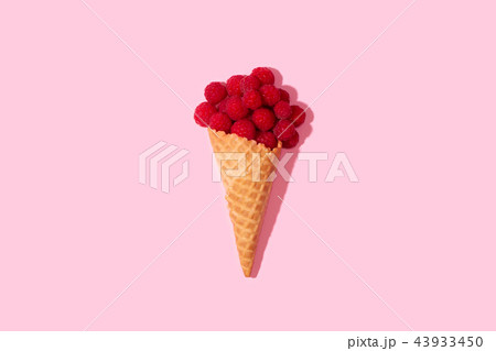 Bright ripe strawberry on a pastel background. Bright ripe strawberry on a pastel background. 43933450