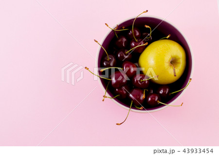 Bright ripe strawberry on a pastel background. Bright ripe strawberry on a pastel background. 43933454