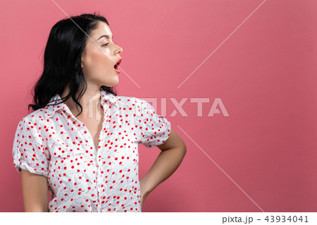 Young woman talking Young woman talking 43934041