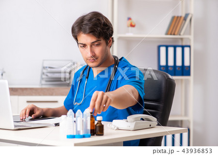 Young doctor working in the hospital 43936853