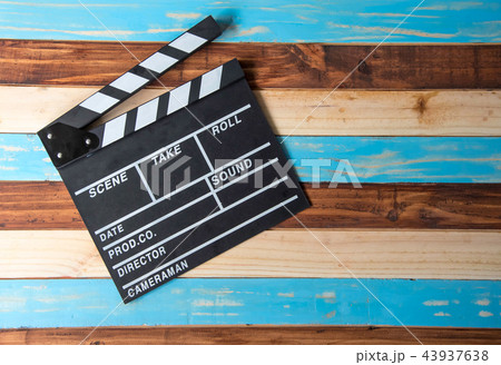 Slate for cut film placed on wooden floor. Slate for cut film placed on wooden floor. 43937638