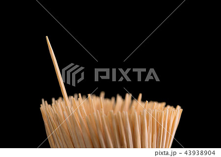 Toothpicks on a black background 43938904