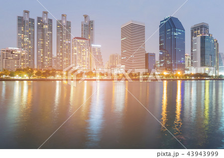 Night city office building river front 43943999