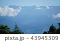 Mountain peak range landscape. Green mountain range view. Mountain peak blue sky white clouds 43945309