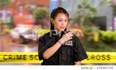 Asian American Police Officer at Crime scene  43946150
