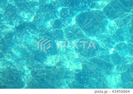 blue water in the swimming-pool texture background blue water in the swimming-pool texture background 43950804