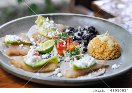 blackened fish tacos with avocado 43950934