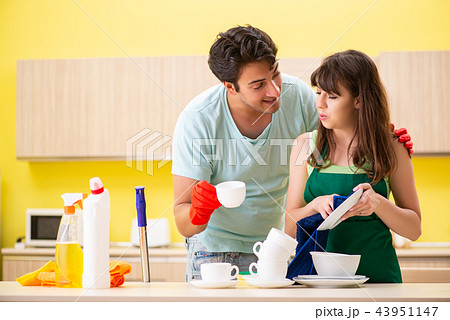 Young couple working at kitchen  43951147