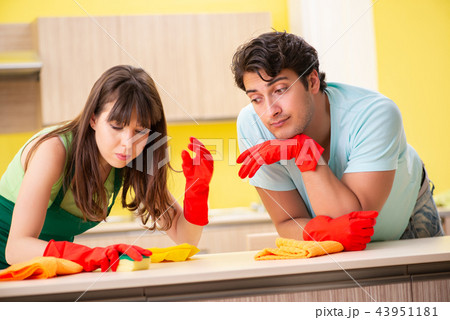 Young couple working at kitchen  43951181
