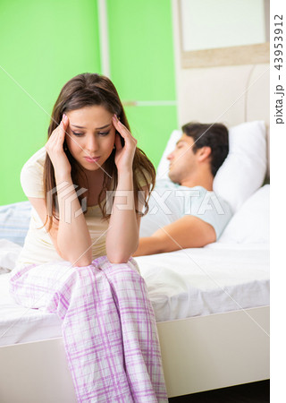 Woman and man in the bedroom after conflict 43953912