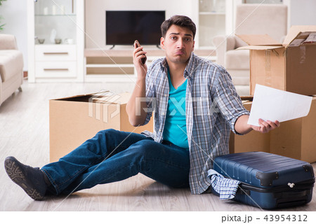 Unemployed man receiving foreclosure notice letter 43954312