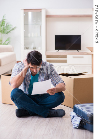 Unemployed man receiving foreclosure notice letter 43954322