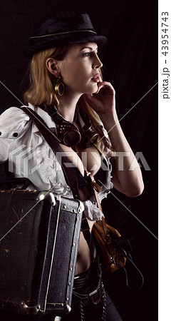 Sexy girl wearing steampunk costume with suitcase 43954743