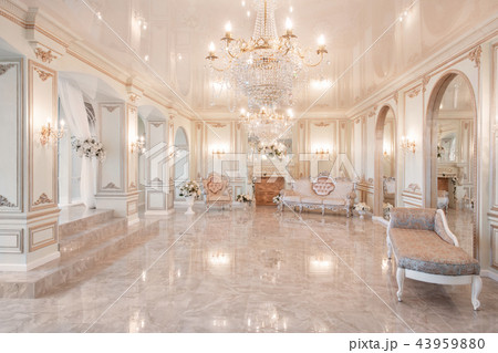 daylight in the interior and light of electric lamps. Morning in luxurious light interior in mansion daylight in the interior and light of electric lamps. Morning in luxurious light interior in mansion 43959880